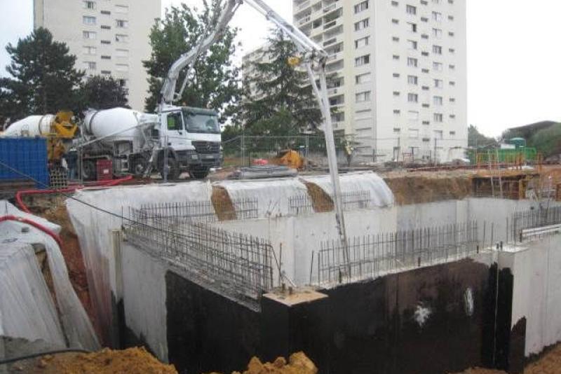 CONSTRUCTION DE LA DALLE BETON DE LA FOSSE